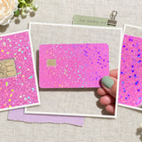 Close up flat lay of the pink holographic glitter card skin texture and chip cutout by The Sticker Era