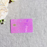 Baby pink sparkle card skin catching rainbow light by The Sticker Era