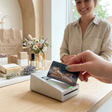 Magic book card skin in hand, holographic reader card cover by The Sticker Era