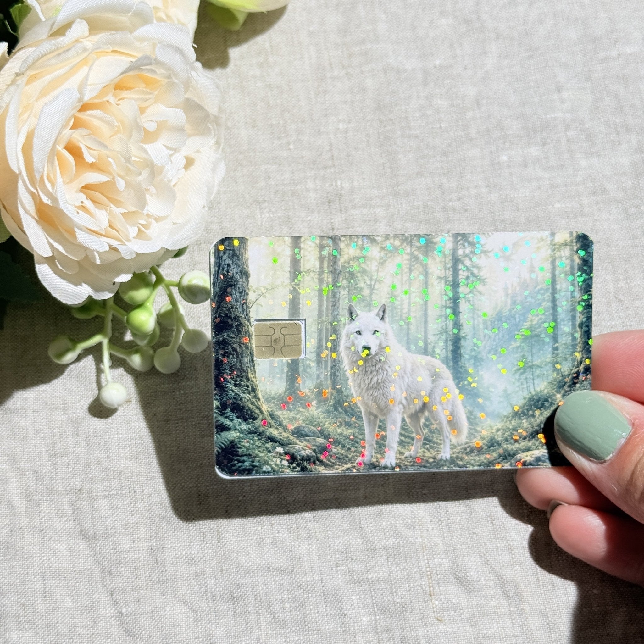 Misty Forest Wolf Card Skin – White Wolf in Sunlit Woods Debit & Credit Card Sticker by The Sticker Era