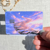 Book staircase card skin held in hand for scale