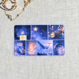 Blue night sky grid debit card sticker shown flat on linen