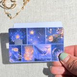Two celestial collage card skins stacked to show the standard and sparkle finishes