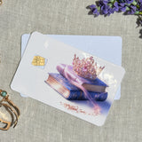 Two crown and books card skins stacked to show the standard and sparkle finishes