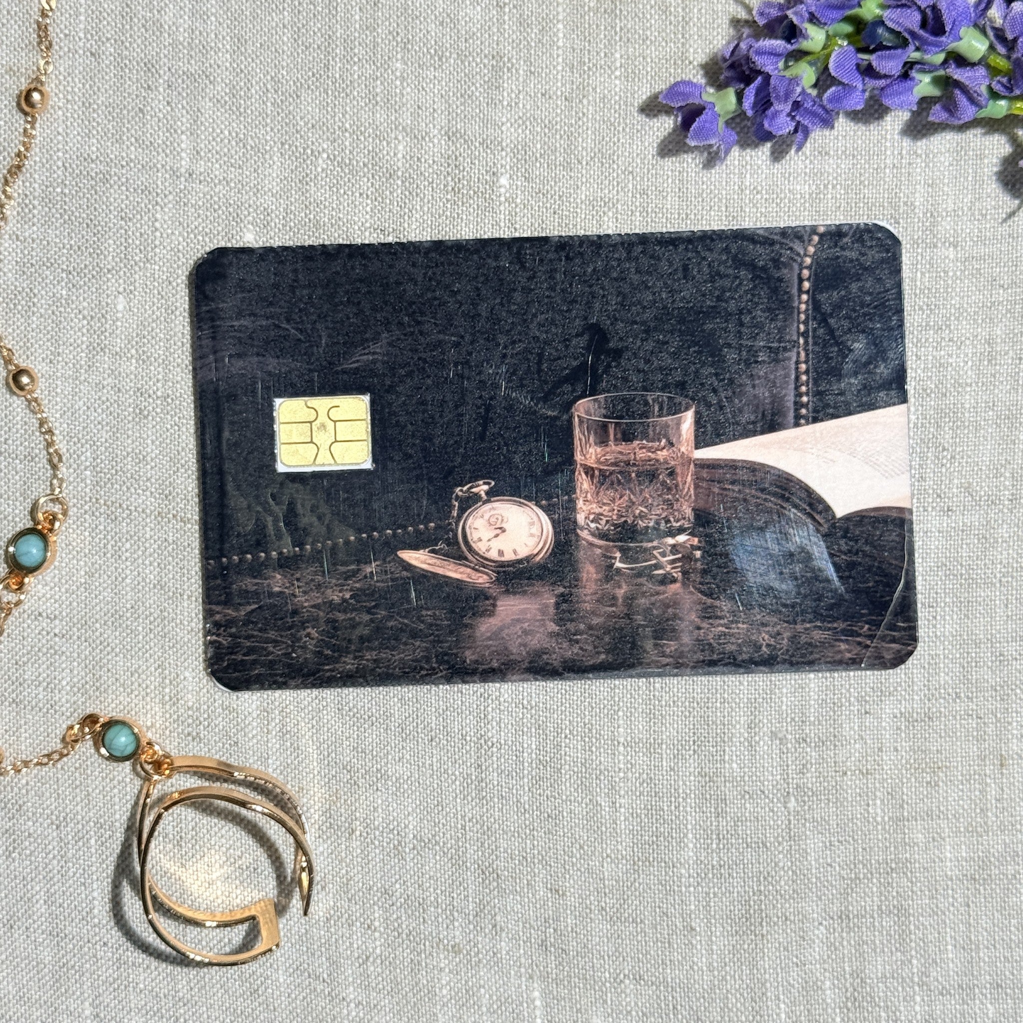 Close up of the pocket watch and open book detail with the chip cutout