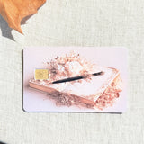 Close up of the pen and dried floral detail with the chip cutout