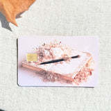 Quill and roses card skin showing the soft pink background