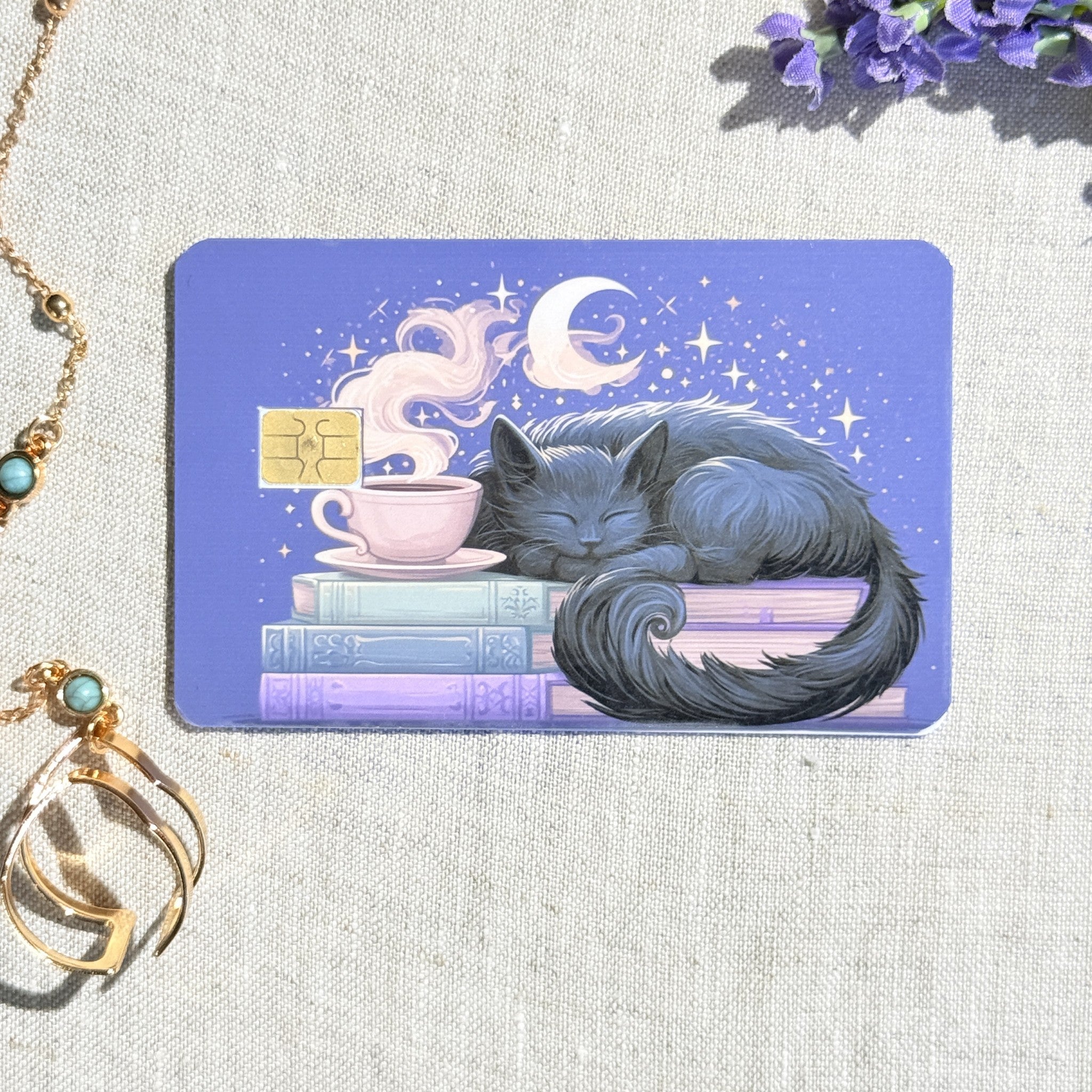 Close up of the sleeping cat and teacup detail with the chip cutout