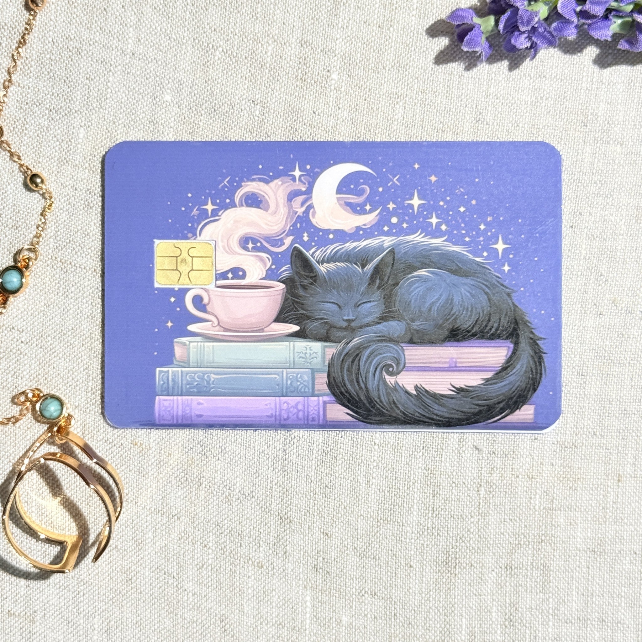 Sleepy cat card skin showing the periwinkle night sky background