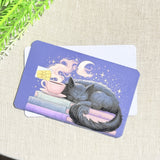 Two sleepy cat card skins stacked to show the standard and sparkle finishes