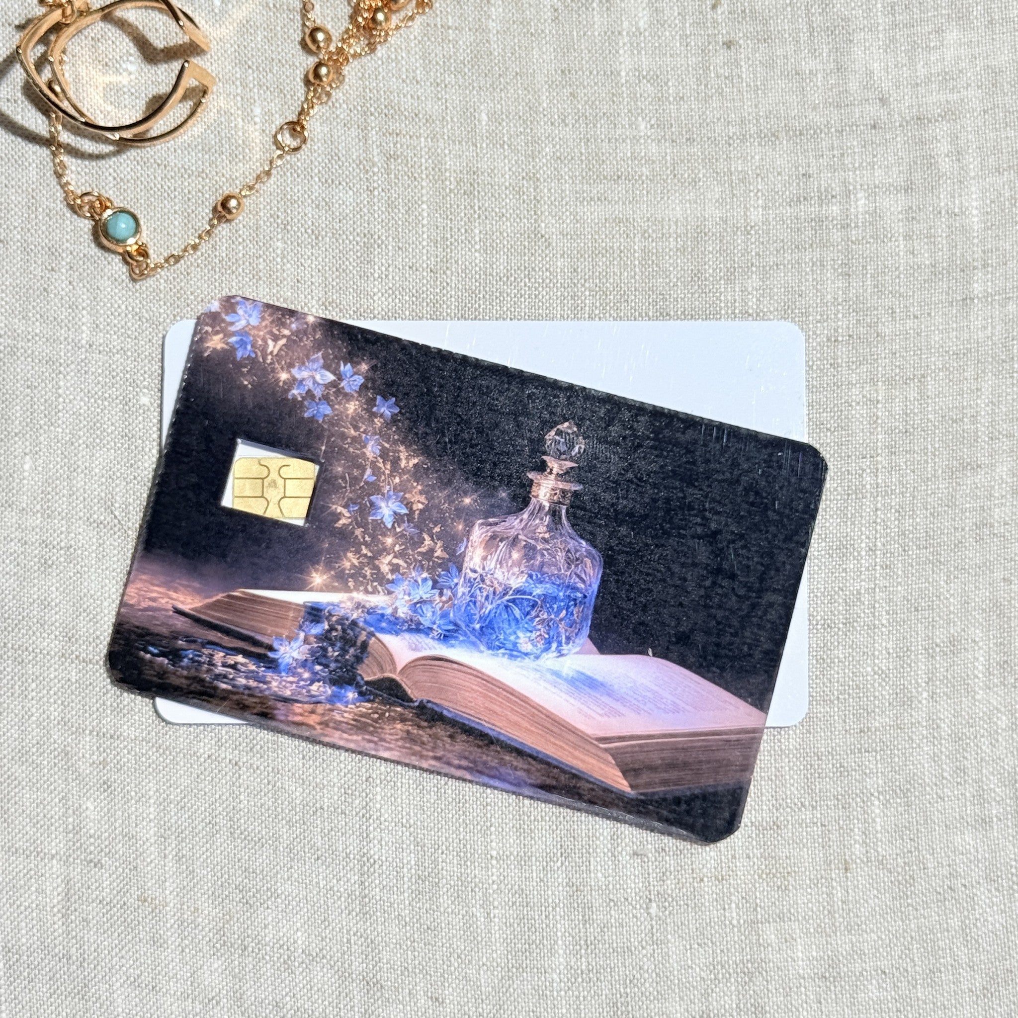 Starlight Potion Card Skin – Glowing Blue Bottle Debit & Credit Card Sticker by The Sticker Era