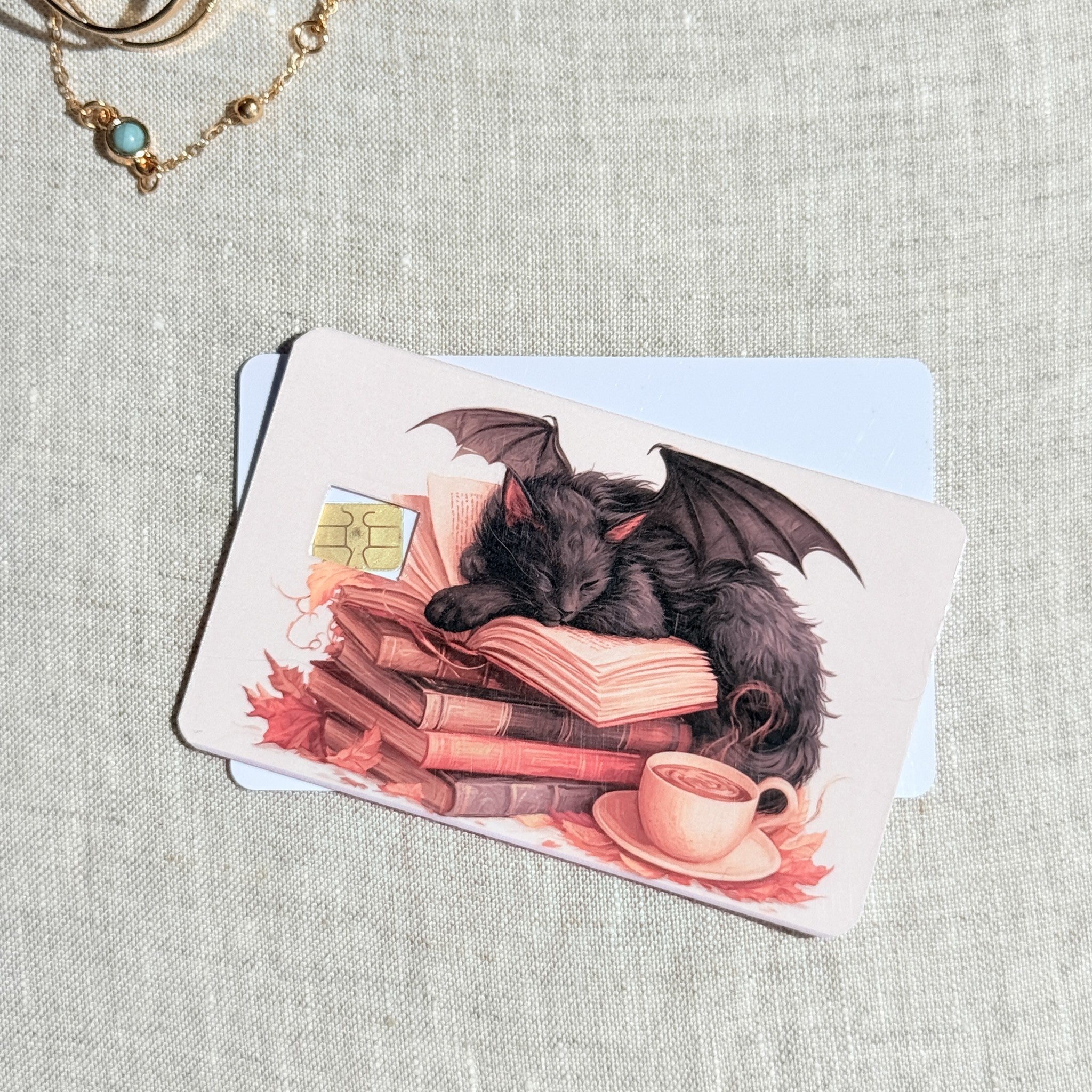 Winged Cat Card Skin – Sleepy Bookish Familiar Debit & Credit Card Sticker by The Sticker Era