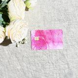 Pink marble gold vein card skin flat lay on cream linen by The Sticker Era