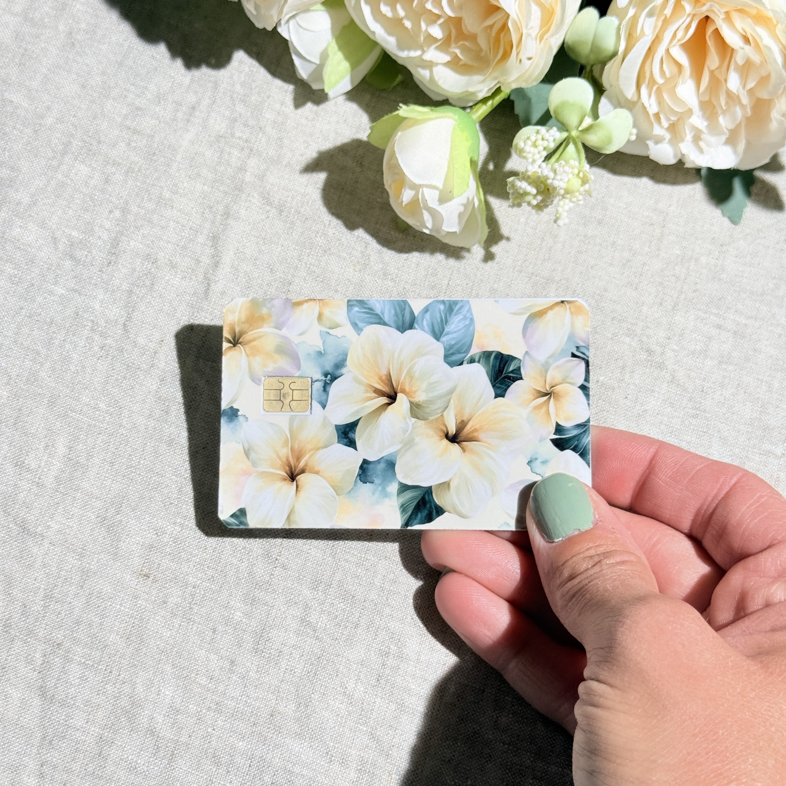 Plumeria credit card sticker showing chip cutout by The Sticker Era