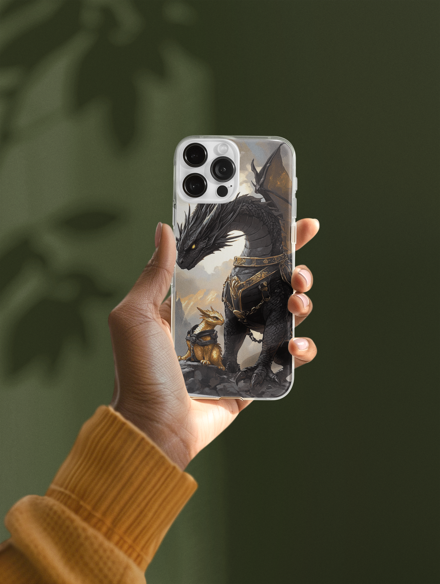 Woman holding clear iPhone case with dragon family insert - emotional dragon art

