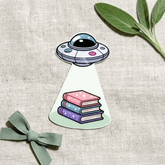 UFO Book Abduction Sticker – Pastel Alien Bookish Decal – Sticker Era by The Sticker Era