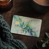 Tapping the green marble card skin at a cafe card reader beside a latte by The Sticker Era