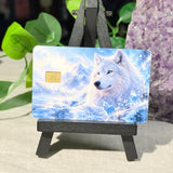Snow Wolf Card Skin – White Wolf in Icy Mountains Debit & Credit Card Sticker by The Sticker Era
