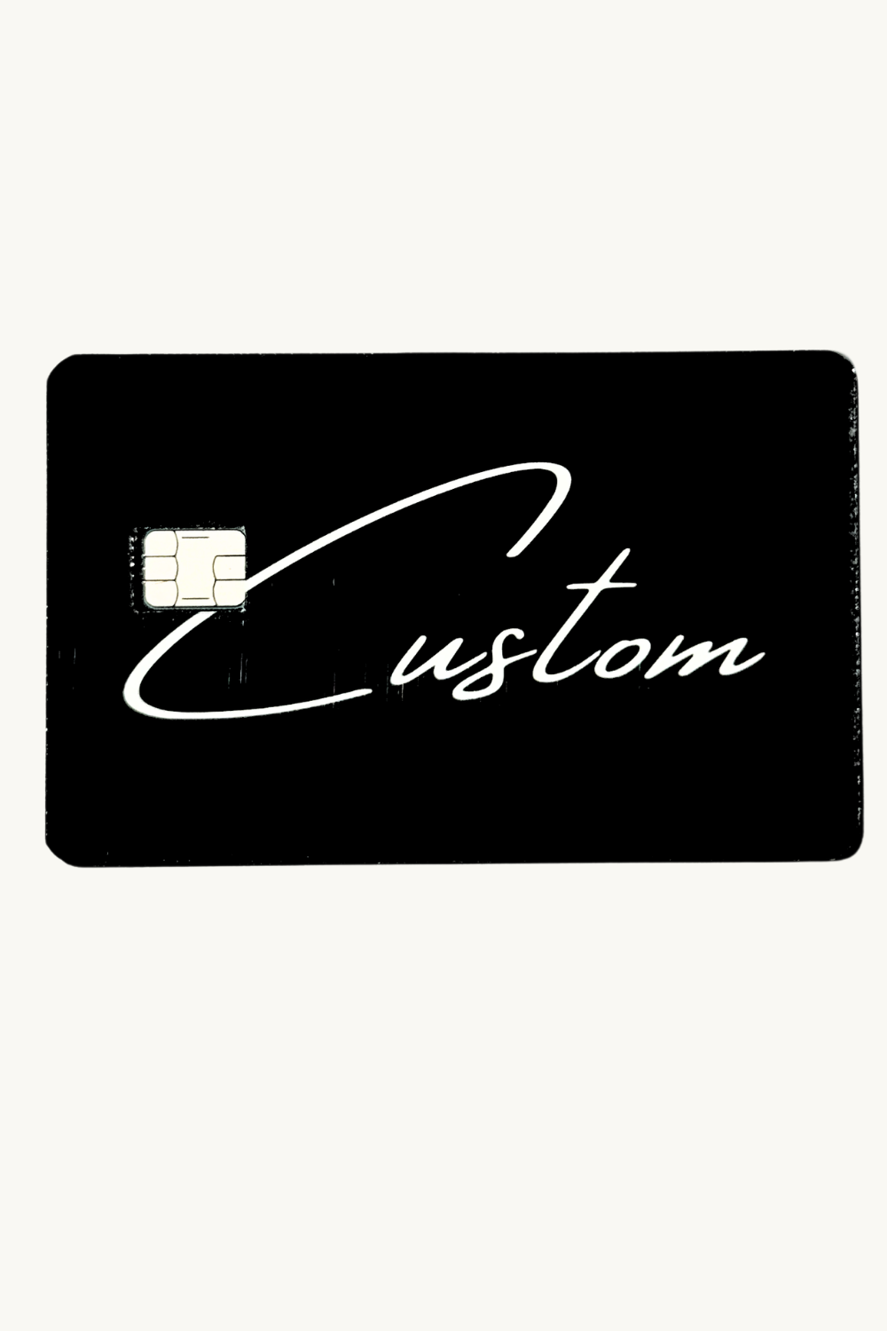 Hand holding personalized custom card skin showing vinyl quality and size