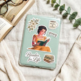 Tattooed princess in yellow gown reading, waterproof vinyl sticker by The Sticker Era