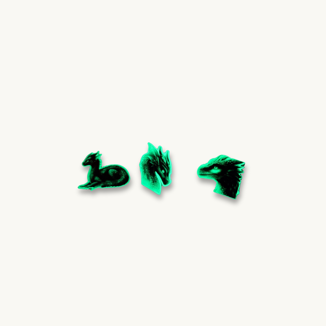 Set of three neon dragon stickers that glow in the dark, fantasy creature decals.