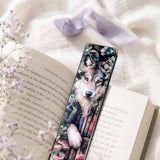 Wolf bookmark tucked into an open book by The Sticker Era