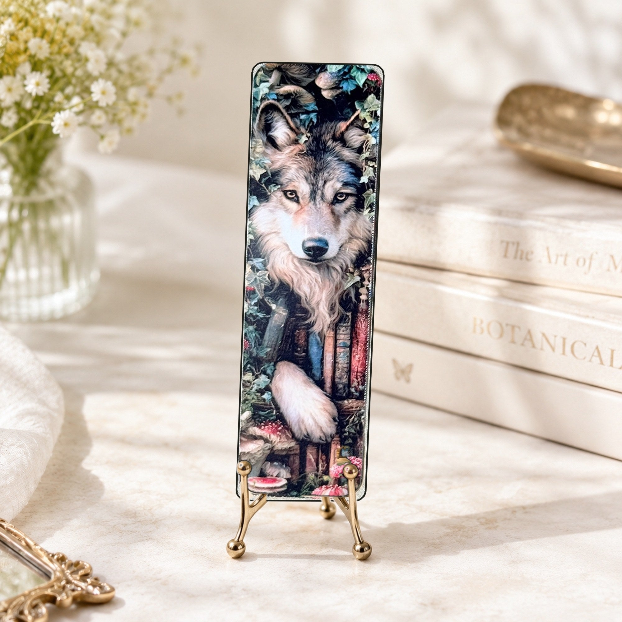 Wolf bookmark on brass display by The Sticker Era