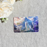 Close-up of holographic sparkle over the wolf pack and pink sunset sky on the card skin by The Sticker Era